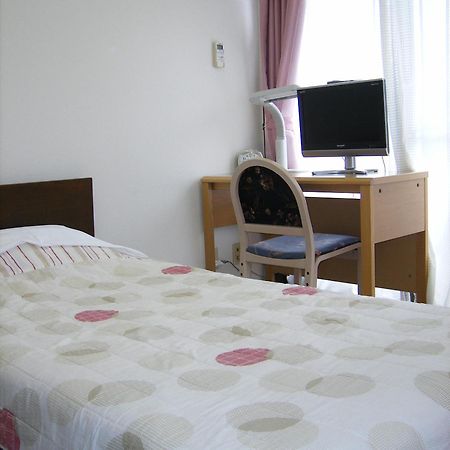 Business Inn Grandeur Футю Экстерьер фото