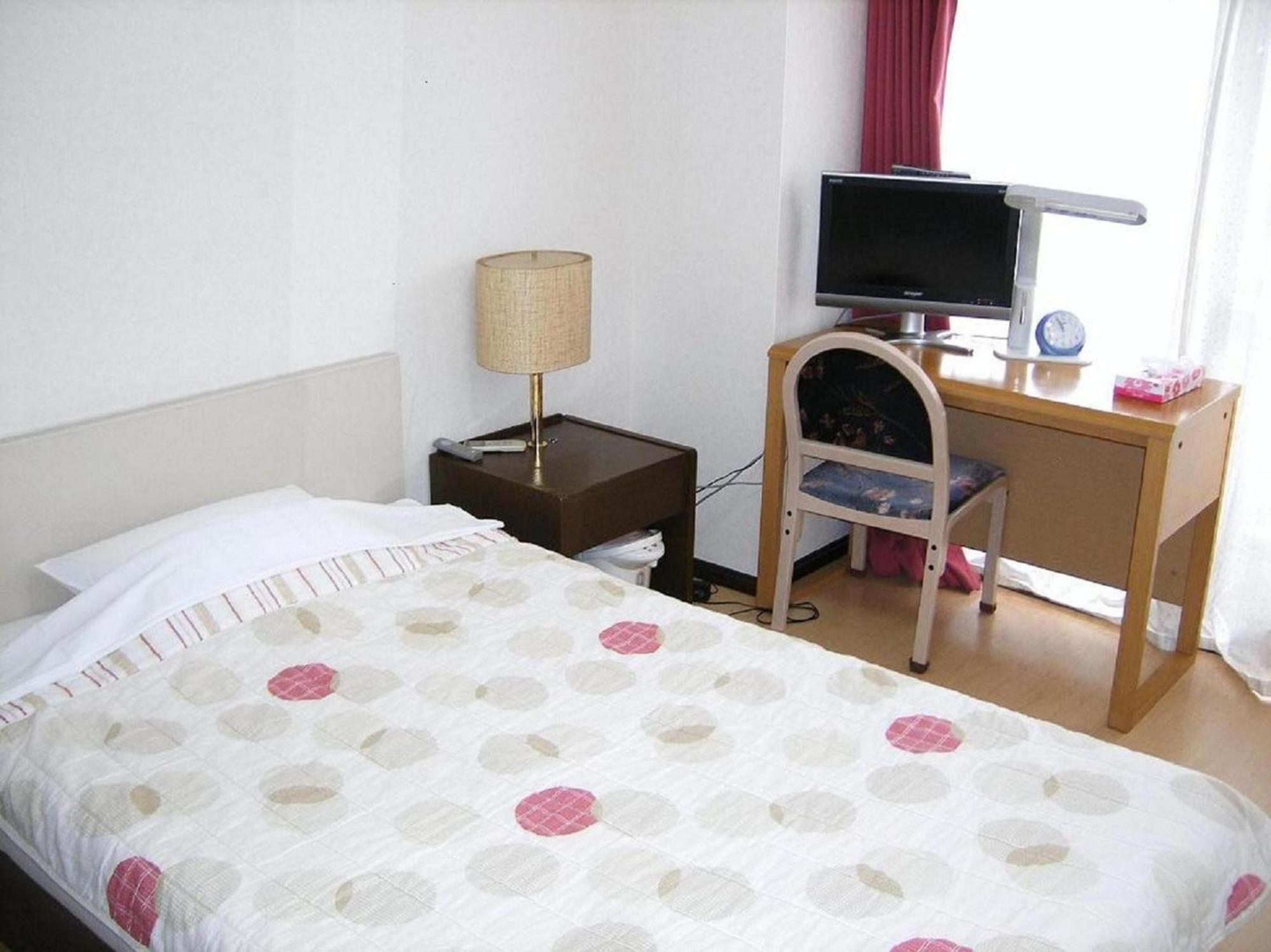 Business Inn Grandeur Футю Экстерьер фото