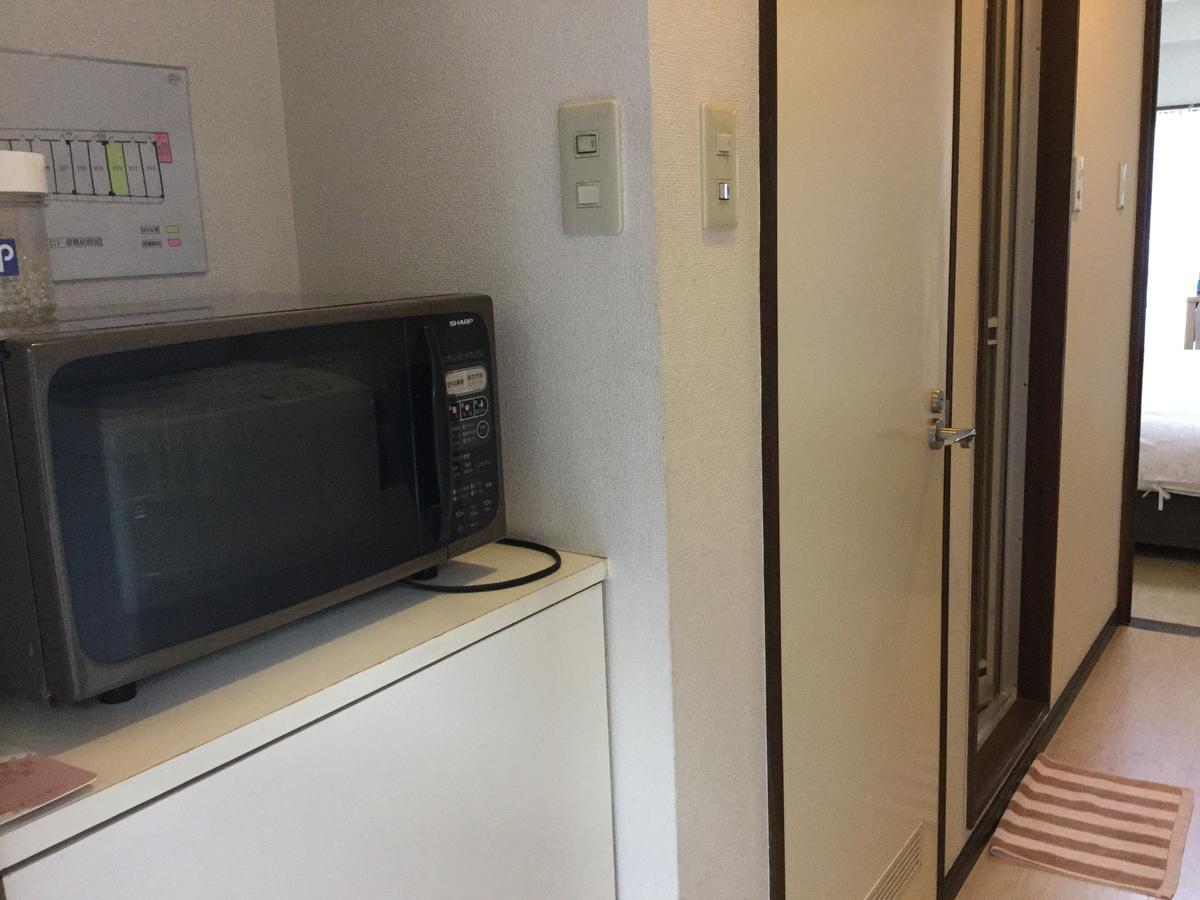 Business Inn Grandeur Футю Экстерьер фото